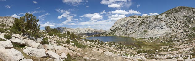 Panorama of Vogelsang basin, surrounding Vogelsang Lake in Yosemite's High Sierra, viewed from near Vogelsang Pass.  Left is Vogelsang Peak (11516'), Choo-choo Ridge is in the distant middle, and the western flank of Fletcher Peak is to the right, Yosemite National Park, California