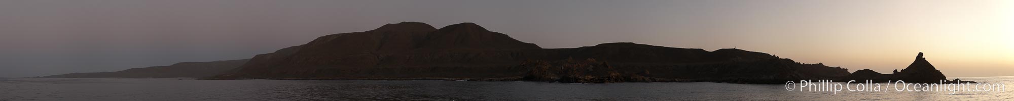 Panoramic photo of San Clemente Island, southern end from China Hat Point (aka, Balanced Rock, right) along the length of Pyramid Cove, sunrise