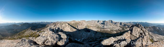 Panoramic view of the Cathedral Range from the summit of Vogelsang Peak (11500').  The shadow of Vogelsang Peak can be seen in the middle of the picture, Yosemite National Park, California