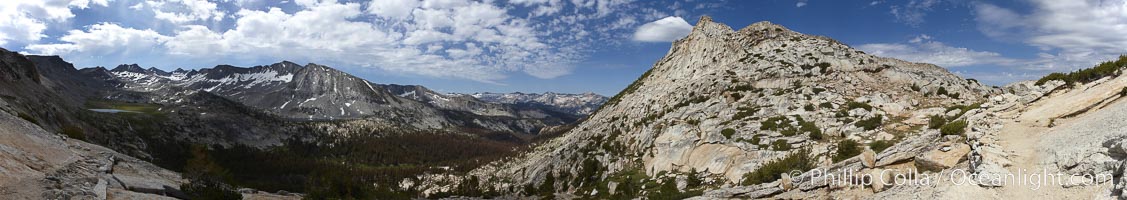 Panoramic view from Vogelsang Pass (10685') in Yosemite's high country, looking south. Visible on the left are Parson's Peak (12147'), Gallison Lake and Bernice Lake in the Cathedral Range, the Clark Range is in the distant middle, while Vogelsang Peak (11516') rises to the right, Yosemite National Park, California