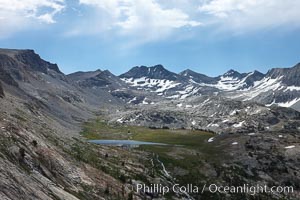 Parson's Peak and Gallison Lake, part of the Cathedral Range of glacier-sculpted granite mountains, viewed from Vogelsang Pass in Yosemite's High Sierra, Yosemite National Park, California