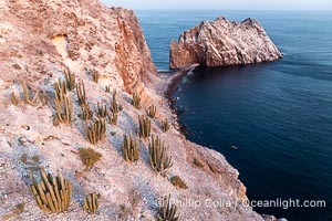 Rugged Terrain of Isla San Pedro Martir, Sea of Cortez. Aerial photo. The large bird population deposits enormous quantities of guano on the island, resulting in the white appearance of the island contrasted with sparse vegetation. In the late 19th and early 20th century guano was heavily mined off the island and shipped as far as Europe for use as fertilizer. San Pedro Martir is seldom visited, having near vertical sides leaving only questionable fair weather anchorages in two locations. Landing access was possible near a small isthmus in the southeast of the island, but is now forbidden. In 2005, the island was classified along with 244 others as a World Heritage Site by UNESCO, and included in the Islands and Protected Areas of the Gulf of California