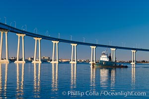 San Diego Coronado Bridge, linking San Diego to the island community of Coronado, spans San Diego Bay.  Dawn