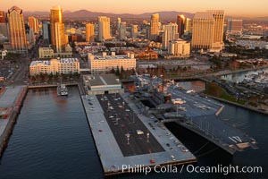 San Diego downtown waterfront, with USS Midway aircraft carrier and Navy museum (right), sunset
