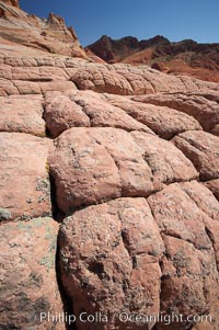 Sandstone joints.  These cracks and joints are formed in the sandstone by water that seeps into spaces and is then frozen at night, expanding and cracking the sandstone into geometric forms, North Coyote Buttes, Paria Canyon-Vermilion Cliffs Wilderness, Arizona