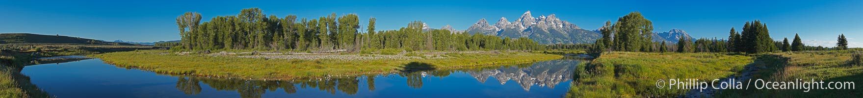 Panorama of the Teton Range reflected in the still waters of Schwabacher Landing, a sidewater of the Snake River, Grand Teton National Park, Wyoming