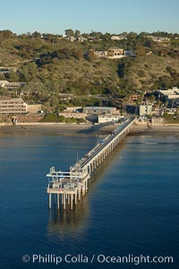 SIO Pier, Scripps Pier, La Jolla.  The Scripps Institution of Oceanography research pier is 1090 feet long and was built of reinforced concrete in 1988, replacing the original wooden pier built in 1915. The Scripps Pier is home to a variety of sensing equipment above and below water that collects various oceanographic data. The Scripps research diving facility is located at the foot of the pier. Fresh seawater is pumped from the pier to the many tanks and facilities of SIO, including the Birch Aquarium. The Scripps Pier is named in honor of Ellen Browning Scripps, the most significant donor and benefactor of the Institution