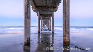 Scripps Institution of Oceanography Pier and Belt of Venus in pre-dawn light. The Earth's shadow appears as the blue just above the horizon, La Jolla, California