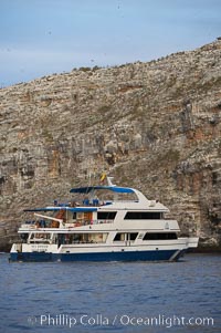 Sky Dancer, a liveaboard dive tour boat, at anchor, Wolf Island