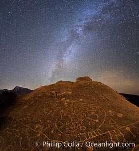 The Milky Way at Night over Sky Rock.  Sky Rock petroglyphs near Bishop, California. Hidden atop an enormous boulder in the Volcanic Tablelands lies Sky Rock, a set of petroglyphs that face the sky. These superb examples of native American petroglyph artwork are thought to be Paiute in origin, but little is known about them