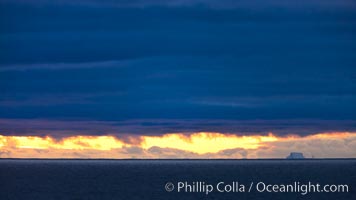 Clouds, weather and light mix in neverending forms over the open ocean of Scotia Sea, in the Southern Ocean