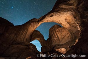 Stars and Iridium Flare over Double Arch, Arches National Park