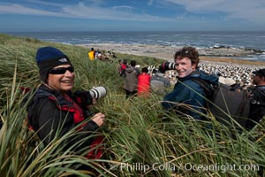 Doug Cheeseman (left), founder of Cheeseman's Ecology Safaris, and professional photographer and guide Patrick Endres (right) enjoy the spectacle of the enormous breeding colony of black-browed albatrosses at Steeple Jason Island, Thalassarche melanophrys