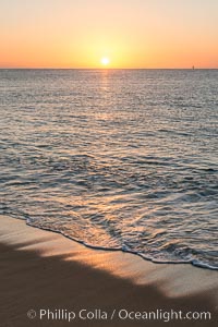 Sunrise on Medano Beach, on the coast of Cabo San Lucas, Mexico