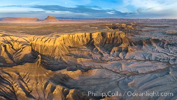 Sunrise over the Skyline Rim, Factory Bench and Lower Blue Hills, Utah. Factory Butte is in the distance