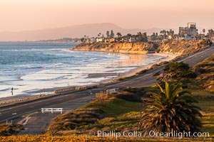 Carlsbad Coast Highway Sunset, Terramar and North Ponto to Oceanside with Camp Pendleton in the distance. Rising in the distance is San Onofre Mountain (1722') topped by a tall signal tower, one of the southern peaks in the Santa Ana Mountains