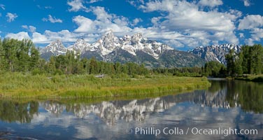 Panorama of the Teton Range, reflected in the still waters of Schwabacher Landing, a sidewater of the Snake River, Grand Teton National Park, Wyoming