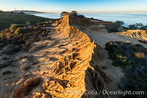 Broken Hill by the first light of dawn, overlooking the Pacific Ocean and Torrey Pines State Reserve, La Jolla and Mount Soledad in the distance, San Diego, California