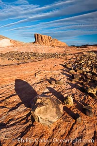 Boulders and sandstone striations, mountain butte, dawn, Valley of Fire State Park