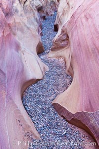 Slot canyon, sandstone detail and gravel, formed by water erosion, Valley of Fire State Park