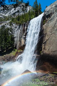 A rainbow forms in the thick mist surrounding Vernal Falls, Little Yosemite Valley, Spring, Yosemite National Park, California