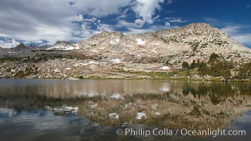 Vogelsang Peak reflected in spectacular Vogelsang Lake, in Yosemite's high country near the John Muir Trial and Vogelsang High Sierra Camp.  Vogelsang Peak (11516') was sculpted by glaciers from monolithic granite, Yosemite National Park, California