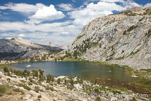 Spectacular Vogelsang Lake in Yosemite's High Sierra, with Fletcher Peak (10319') to the right and Choo-choo ridge in the distance, near Vogelsang High Sierra Camp, Yosemite National Park, California