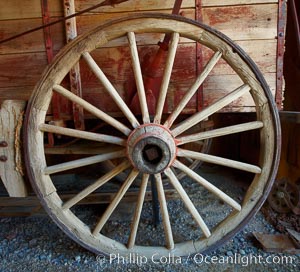 Wagon wheel, in County Barn, Bodie State Historical Park, California