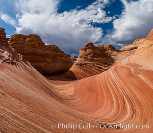 The Wave in the North Coyote Buttes, an area of fantastic eroded sandstone featuring beautiful swirls, wild colors, countless striations, and bizarre shapes set amidst the dramatic surrounding North Coyote Buttes of Arizona and Utah. The sandstone formations of the North Coyote Buttes, including the Wave, date from the Jurassic period. Managed by the Bureau of Land Management, the Wave is located in the Paria Canyon-Vermilion Cliffs Wilderness and is accessible on foot by permit only