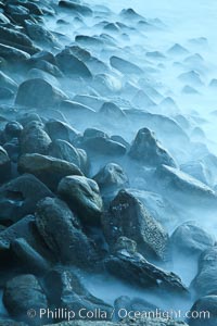 Waves and beach boulders, abstract study of water movement, La Jolla, California