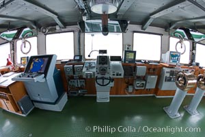 Wheelhouse of the ship M/V Polar Star, with navigation equipment, helm controls, communications, and a great view