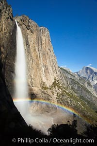 Yosemite Falls and rainbow, Half Dome in distance, viewed from the Yosemite Falls trail, spring, Yosemite National Park, California