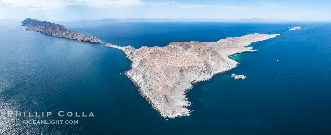 Aerial photo of Islas San Lorenzo in the Sea of Cortez. San Lorenzo Marine Archipelago National Park is a national park of Mexico located on San Lorenzo Island part of an archipelago in the Gulf of California off the eastern coast of Baja California. The San Lorenzo Archipelago is considered one of the most important ecological areas of the Gulf of California. The Island and surrounding areas are part of a rich ecosystem comprised by a grand variety of flora and marine fauna. This area is protected by the Mexican federal government Norma Oficial Mexicana because of its importance as a habitat for several endangered species., natural history stock photograph, photo id 40454