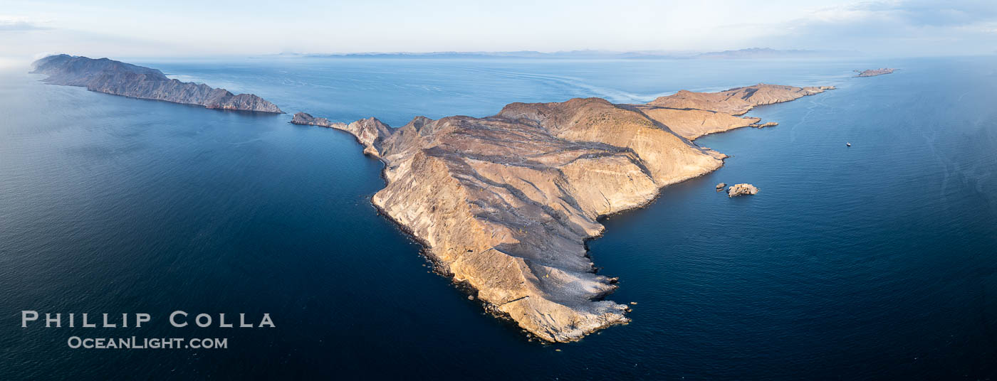 Aerial photo of Islas San Lorenzo in the Sea of Cortez. San Lorenzo Marine Archipelago National Park is a national park of Mexico located on San Lorenzo Island part of an archipelago in the Gulf of California off the eastern coast of Baja California. The San Lorenzo Archipelago is considered one of the most important ecological areas of the Gulf of California. The Island and surrounding areas are part of a rich ecosystem comprised by a grand variety of flora and marine fauna. This area is protected by the Mexican federal government Norma Oficial Mexicana because of its importance as a habitat for several endangered species., natural history stock photograph, photo id 40436