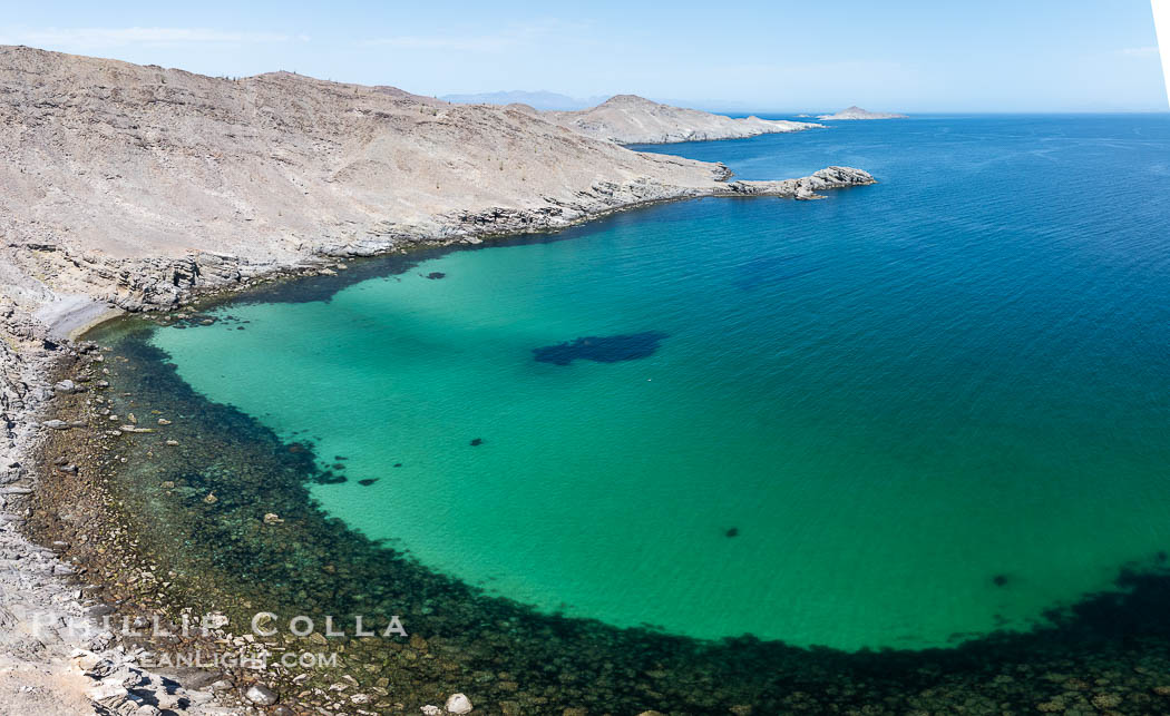 Aerial photo of Islas San Lorenzo in the Sea of Cortez. San Lorenzo Marine Archipelago National Park is a national park of Mexico located on San Lorenzo Island part of an archipelago in the Gulf of California off the eastern coast of Baja California. The San Lorenzo Archipelago is considered one of the most important ecological areas of the Gulf of California. The Island and surrounding areas are part of a rich ecosystem comprised by a grand variety of flora and marine fauna. This area is protected by the Mexican federal government Norma Oficial Mexicana because of its importance as a habitat for several endangered species., natural history stock photograph, photo id 40456