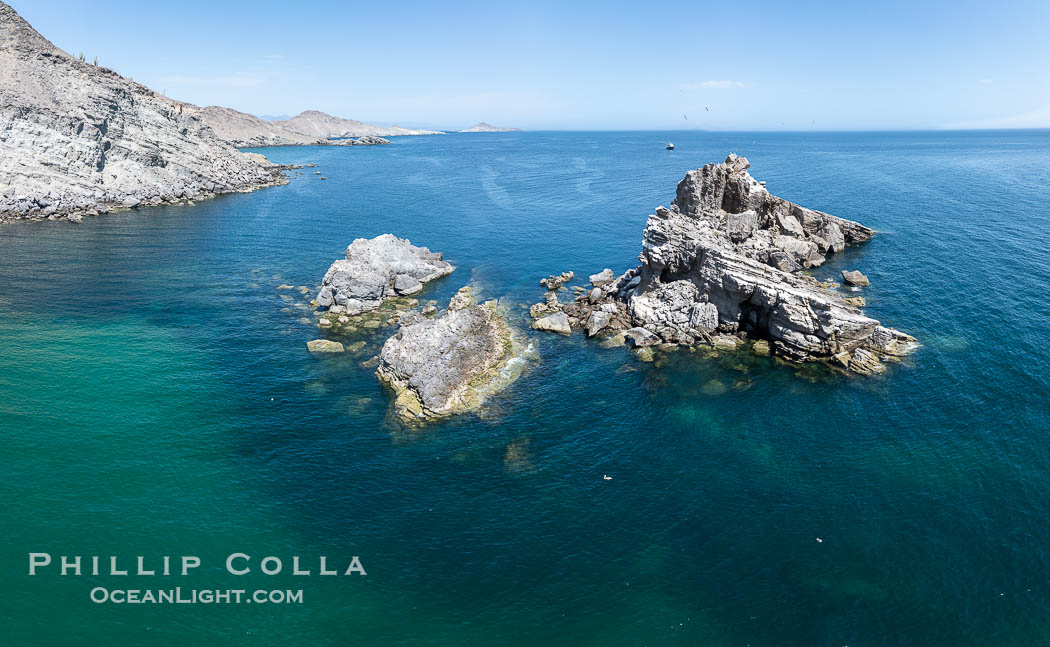 Aerial photo of Islas San Lorenzo in the Sea of Cortez. San Lorenzo Marine Archipelago National Park is a national park of Mexico located on San Lorenzo Island part of an archipelago in the Gulf of California off the eastern coast of Baja California. The San Lorenzo Archipelago is considered one of the most important ecological areas of the Gulf of California. The Island and surrounding areas are part of a rich ecosystem comprised by a grand variety of flora and marine fauna. This area is protected by the Mexican federal government Norma Oficial Mexicana because of its importance as a habitat for several endangered species., natural history stock photograph, photo id 40457