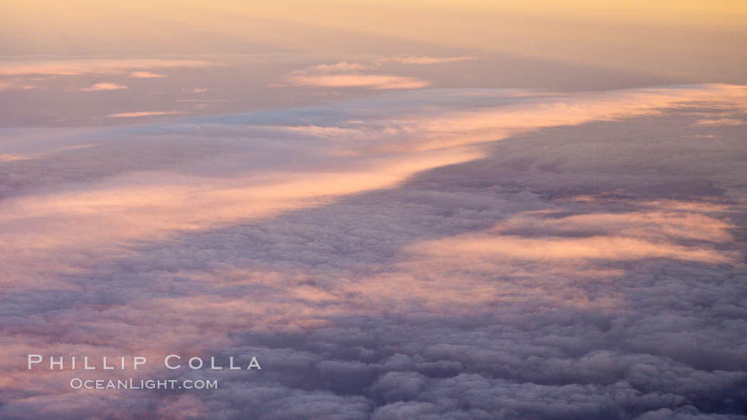 Clouds and sunrise, at 35000 feet., natural history stock photograph, photo id 26192