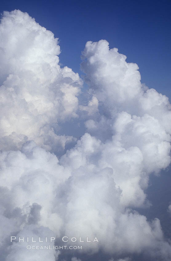 Clouds form in a blue sky., natural history stock photograph, photo id 18519