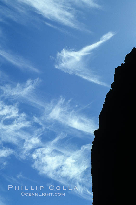 Clouds, blue sky and sea cliffs. Guadalupe Island (Isla Guadalupe), Baja California, Mexico, natural history stock photograph, photo id 18513