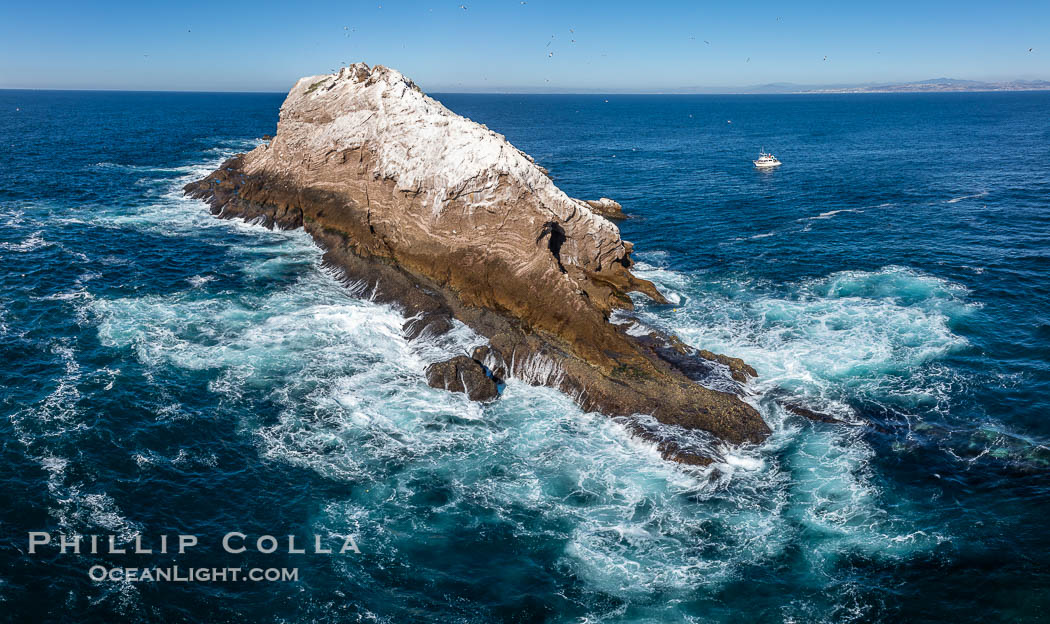 Middle Coronado Rock Island, rough seas all around, aerial photo. Coronado Islands (Islas Coronado), Baja California, Mexico, natural history stock photograph, photo id 40744