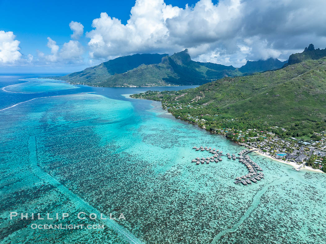 Moorea rises above its lagoon and barrier reef, French Polynesia, aerial view. Cooks Bay lies in the distance. France, natural history stock photograph, photo id 40672