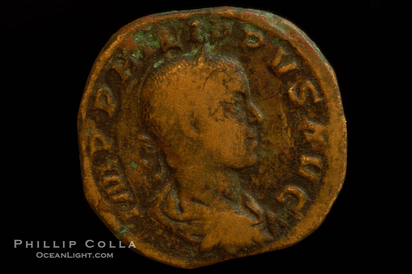 Roman emperor Philip II (247-249 A.D.), depicted on ancient Roman coin (bronze, denom/type: Sestertius) (AE Sestertius Obverse: IMP PHILIPPVS AVG. Reverse: PAX ATERNA SC. Pax standing left.)., natural history stock photograph, photo id 06812